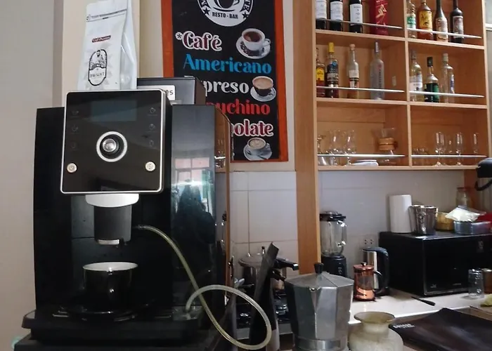 Haylli Café Oro Hotel *
